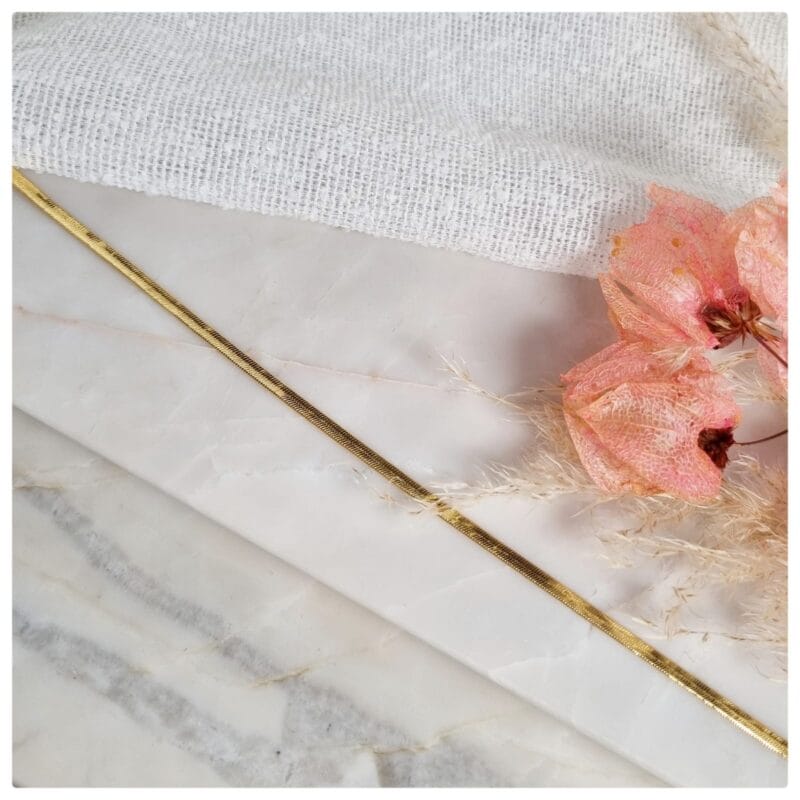 Tornozeleira dourada esteira