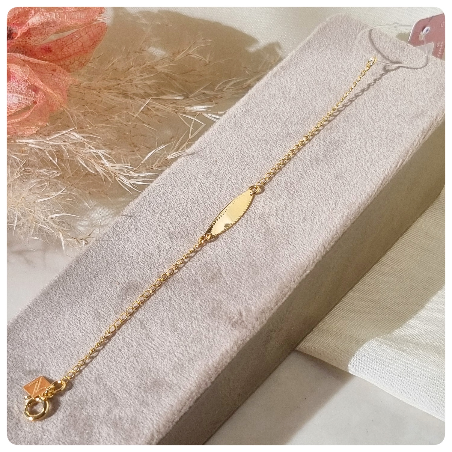 Pulseira infantil com plaquinha