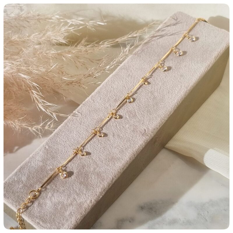Pulseira dourada cristais