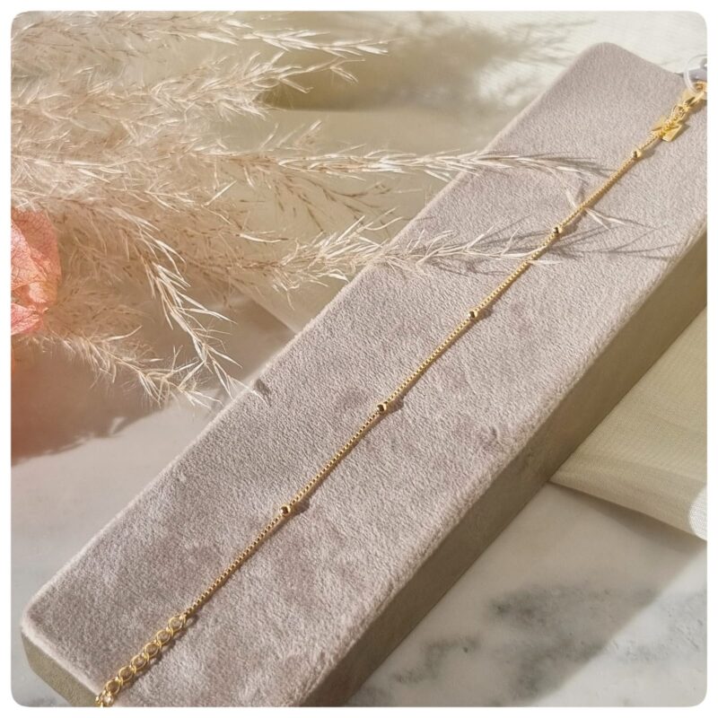 Pulseira dourada bolinhas