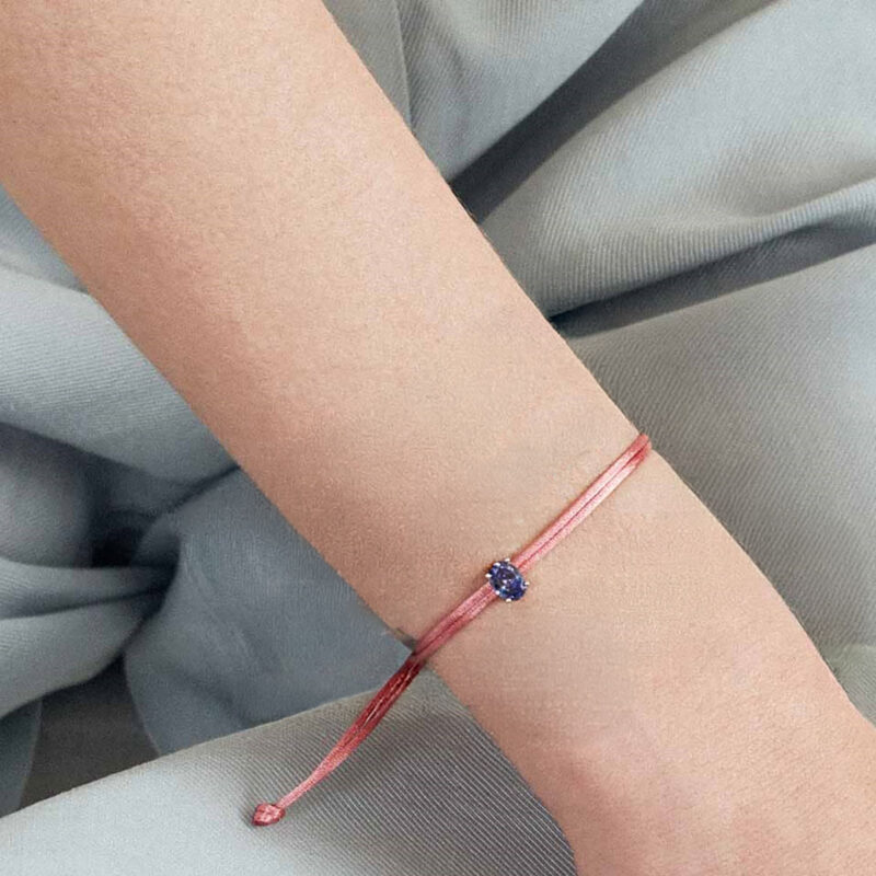 Pulseira de fio encerado rosa com pedra roxa